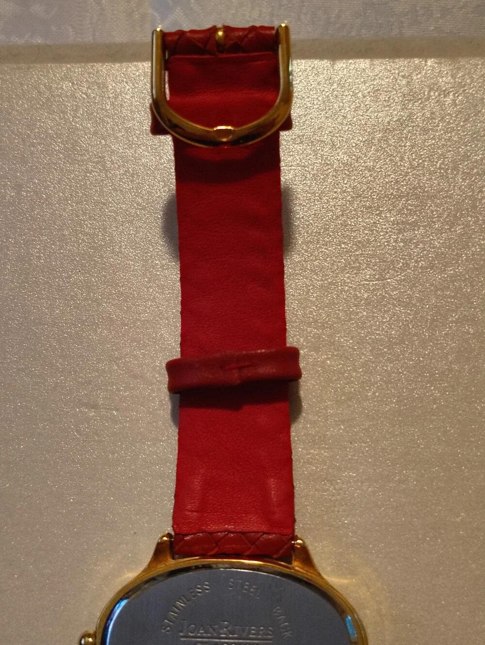 Joan Rivers gold tone